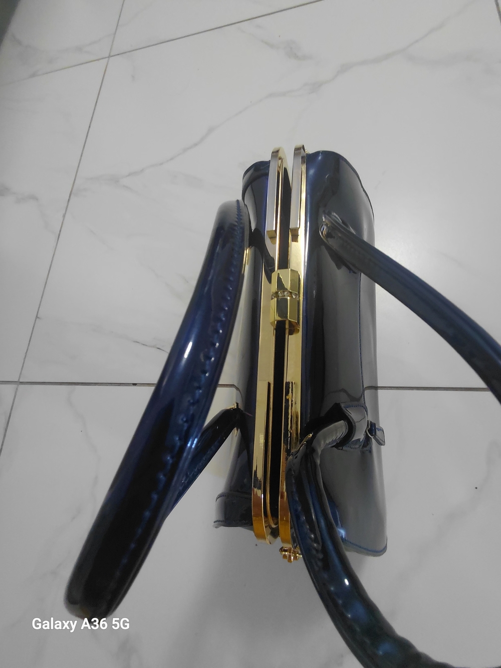 Premium Navy Blue Patent Hand Bag with Gold Hardware..elegant